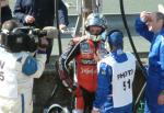 John McGuinness being interviewed in the pits after retiring.