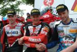 John McGuinness (middle) with Jason Griffiths and Bruce Anstey.