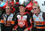 John McGuinness with his team.