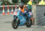 Tom Robinson during practice, leaving the Grandstand, Douglas.