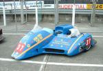 Andy Kinsella/Timothy Dixon's sidecar at the TT Grandstand, Douglas.