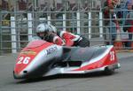 Howard Baker/Nigel Barlow at the TT Grandstand, Douglas.