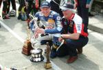 Adrian Archibald with Trophies at the TT Grandstand
