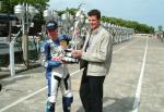 Adrian Archibald with Trophy at the TT Grandstand.