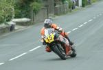 Tony Moss approaching Sulby Bridge.