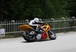 Chris Palmer approaching Braddan Bridge.