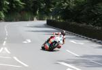 Ian Hutchinson approaching Braddan Bridge.