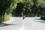 John McGuinness approaching Braddan Bridge.