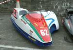 Steve Sinnott/Dave Corlett's sidecar at the TT Grandstand, Douglas.