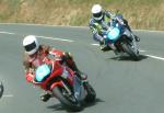 Gordon Taylor (number 63) at Signpost Corner, Onchan.