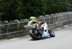 Chris McGahan approaching Braddan Bridge.