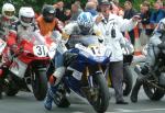 Martin Finnegan (number 12) leaving TT Grandstand.