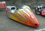 Jean-Claude Huet/Emmanuel Nicholas's sidecar at the TT Grandstand, Douglas.