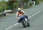 Jerome Faveyrial approaching Sulby Bridge.