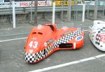 Pascal Hachet/Rene Geffray's sidecar at the TT Grandstand, Douglas.