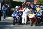 Robert J Price (83) at the TT Grandstand, Douglas.