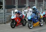 Michael Charnock (number 99) at the Practice Start Line, Douglas.