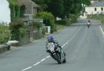 Chris Palmer approaching Sulby Bridge.