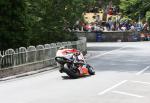 Ian Hutchinson approaching Braddan Bridge.