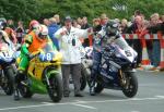 Bruce Anstey (number 5) leaving TT Grandstand.