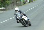 Robert J Price approaching Sulby Bridge.