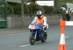 Sally Harmer during practice, leaving the Grandstand, Douglas.