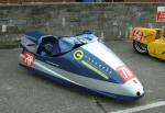 Alan Molyneux/David Beattie's sidecar at the TT Grandstand, Douglas.