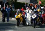 Frank Spenner (62) at the TT Grandstand, Douglas.