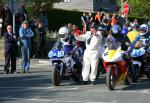 Robert J Price (83) at the TT Grandstand, Douglas.