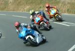 Ian Pattinson (number 7) at Signpost Corner, Onchan.