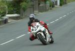 Jon Vincent approaching Sulby Bridge.