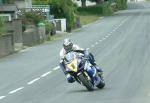 Adrian Archibald approaching Sulby Bridge.