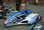 John Holden/Jamie Winn's sidecar at the TT Grandstand, Douglas.