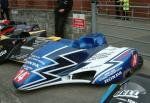 John Holden/Jamie Winn's sidecar at the TT Grandstand, Douglas.