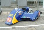 Tony Elmer/Darren Marshall's sidecar at the TT Grandstand, Douglas.