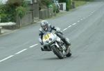 Fabrice Miguet approaching Sulby Bridge.