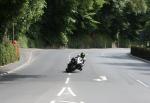 Bruce Anstey approaching Braddan Bridge.