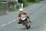 Liam Quinn approaching Sulby Bridge.