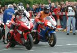 Guy Martin (number 24) leaving TT Grandstand.