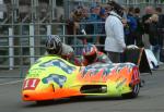 Allan Schofield/Mark Cox at the TT Grandstand, Douglas.