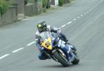 Bruce Anstey approaching Sulby Bridge.