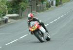 Umberto Rumiano approaching Sulby Bridge.