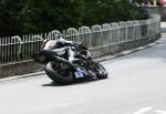 Bruce Anstey approaching Braddan Bridge.