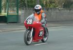 Chris Howitt (99) during practice, leaving the Grandstand, Douglas.