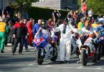 Bruce Anstey (5) at the TT Grandstand, Douglas.