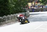 John McGuinness approaching Braddan Bridge.