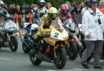 Ian Lougher (number 2) leaving TT Grandstand.