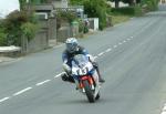 Mike Crellin approaching Sulby Bridge.