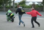 Alan Jackson leaving the Practice Start Line, with a little help.<br><font size=2>(One pusher got carried away and was stopped by the other.)</font>