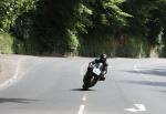 Mickey Fitzpatrick approaching Braddan Bridge.